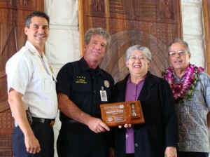 Photo from left to right: Maui Fire Chief Jeffrey Murray, Firefighter I Lawrence "Larry" Crilley, Maui Mayor Charmaine Tavares, Maui Fire Commission Chair Butch Soares