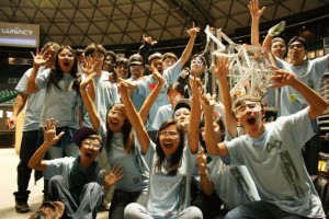The 19-member Maui High robotics team becomes the first Maui team to qualify for the FIRST World Championship. The group was part of at three-team alliance that won the weekend competition on Oahu. Photo Courtesy: Russell Pang, Office of the Governor.