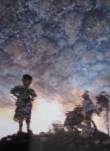 First Place: Ghialana Borges, Kahuku High School, 12th grade Title: Reflections (Silhouette of children near water) Medium: Photography