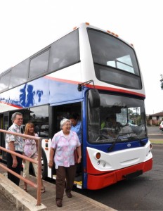 Mayor Steps Off Bus (L-R): County of Maui DOT Director Don Medeiros; Dept. of Planning Deputy Director Kathleen Aoki; Mayor Tavares; Jo-Ann Ridao (background), Deputy Director, Dept. of Housing & Human Concerns. Photo Courtesy: County of Maui.