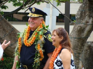 Chief Phillips accompanied by his wife Brenda at a photo unveiling and flag folding ceremony held in his honor. Photo by Wendy OSHER.