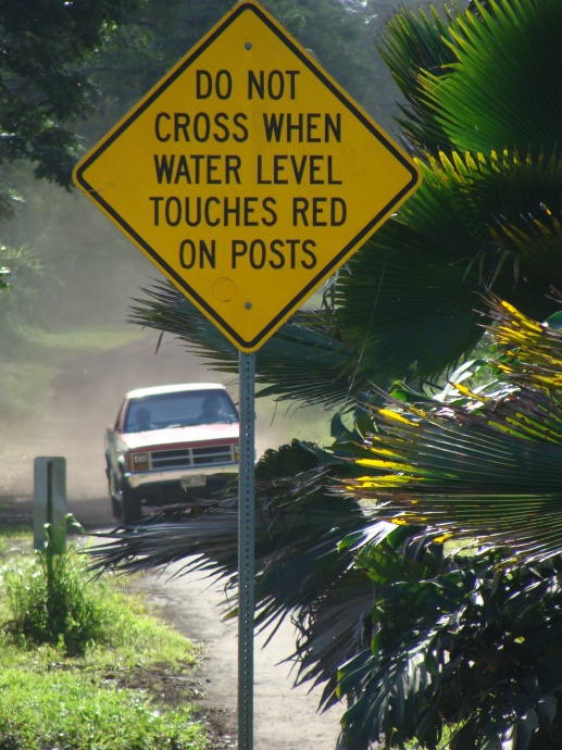 Warning sign posted on 'Ula'ino Road in East Maui. The area is among many across the state that are prone to flooding during heavy rains. File Photo by Wendy Osher.