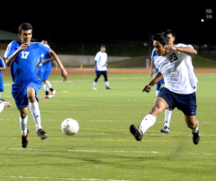 Kamehameha Maui senior Taylor Kaaukai (23) just missed scoring on this attempt midway through the second half Tuesday against Maui High. Photo by Rodney S. Yap.