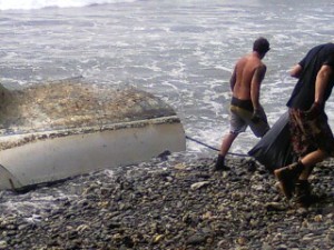 Parker Marine removing the pieces of the Best Revenge. Photos by DLNR Maui District Boating Office.