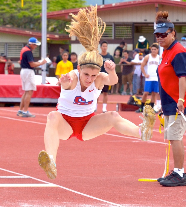 Seabury Hall's Alyssa Bettendorf was busy running the 100 (3rd), 200 (3rd), 400 (2nd) and jumping. The Spartan junior placed third in the long jump at 16 feet, 7 inches. Photo by Rodney S. Yap.