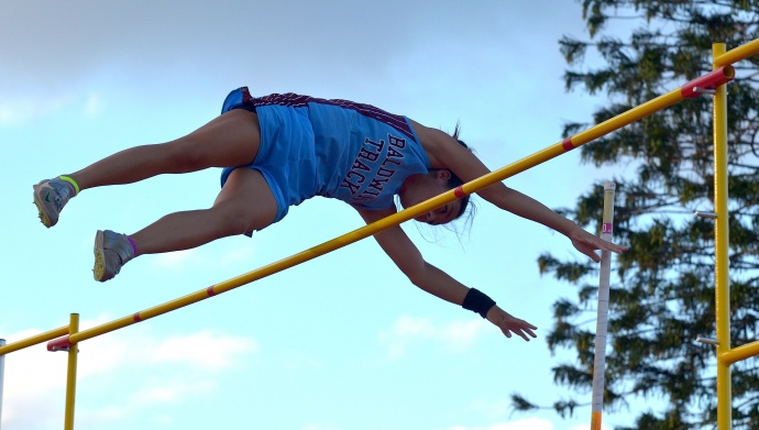 Baldwin's Amber Kozaki sets a new state record in the girls pole vault at 13 feet. Photo by Rodney S. Yap.