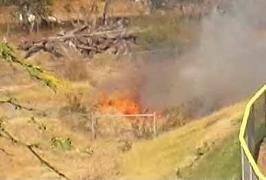 A rush fire was reported on Tuesday afternoon, July 9, 2013 near Leleihoku Street in Wailuku, just outside of the Baldwin HS baseball field. Photo courtesy Robert.