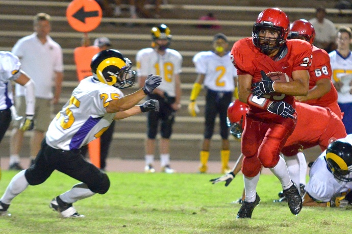 Lahainaluna's Jared Rocha-Islas added 87 yards on seven carries sharing the rushing load. Photo by Rodney S. Yap.