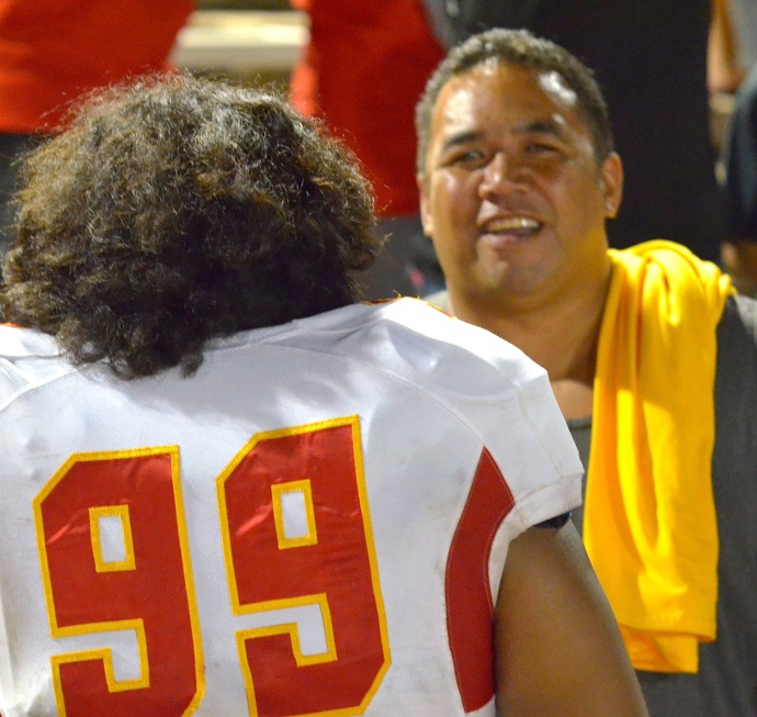 Mission Viejo defensive tackle Neff Haleakala finds his dad, Valentine Haleakala Jr., after Friday's game against Baldwin at War Memorial Stadium. Photo by Rodney S. Yap.