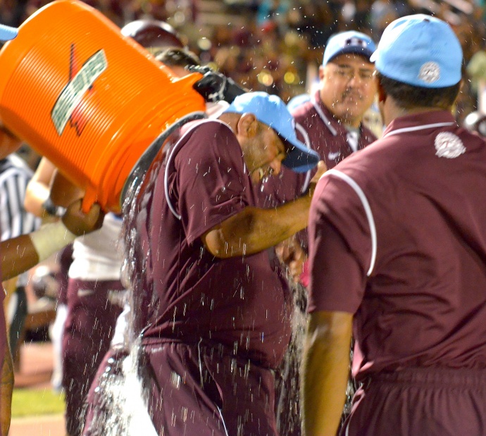 Baldwin head coach Keneke Pacheco could not avoid the Gatorade shower Friday, following his team's 33-13 win over Maui high at War Memorial Stadium. Photo by Rodney S. Yap.