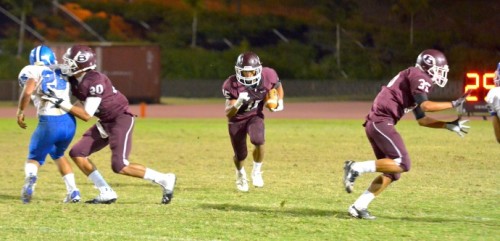 Baldwin's Kawela Kaeo-Mata sees nothing but open field between him and the goal line. Photo by Rodney S. Yap.