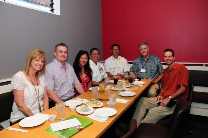 Monsanto’s Carol Reimann (third from left) and David Stoltzfus (on far right) host a luncheon for grant recipients (pictured left to right): Carlayna Nakamura and Dave Jorgensen of the Maui Memorial Medical Center Foundation, Carol Reimann, Captain Lee Mainaga and Chief Jeff Murray of the Maui County Fire & Public Safety Department, Tony Kreig of Hale Makua Health Services and David Stoltzfus. Photo by: Monsanto