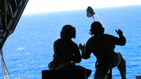 A Coast Guard aircrew from Air Station Barbers Point flew approximately 1,036 miles to airdrop a container of lifesaving blood to a cruise ship northeast of the Hawaiian islands Oct. 6, 2013. Personnel aboard the cruise ship Oosterdam contacted the Coast Guard requesting medical assistance for an ailing passenger. (US Coast Guard photo)