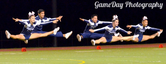 The Kamehameha Schools Maui cheerleaders in action during halftime of a varsity football game at the Warriors' campus earlier this year. Photo courtesy of GameDay Photography.
