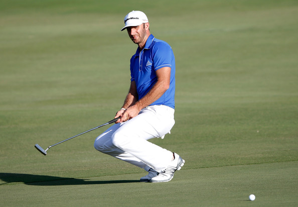 Dustin Johnson reacts to a putt on the 18th green during round three of the Hyundai Tournament of Champions at the Plantation Course on Sunday, Jan, 5. Photo by Tom Pennington/Getty Images.