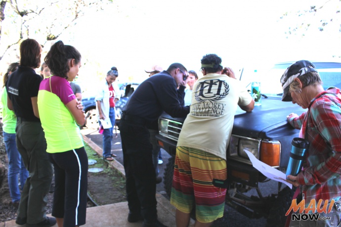 A search party for Carly "Charli" J. Scott gathered at the Haʻikū Community Center this morning. Photo by Wendy Osher.
