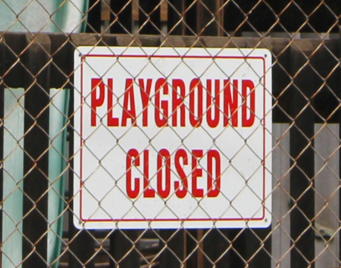 Playground closed sign at Kalakupua, Giggle Hill, Fourth Marine Division Park. Photo by Wendy Osher.