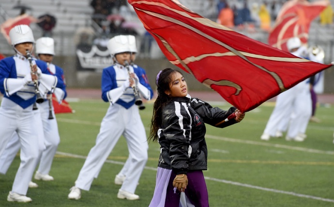 The Maui High School Saber Marching Band & Color Guard performs in the rain and cold Tuesday at Bandfest, a pre-Rose Parade event featuring every marching band that will appear in the New Year's Day Tournament of Roses in Pasadena, Calif. Photo by Walt Mancini, AP / Pasadena Star-News.