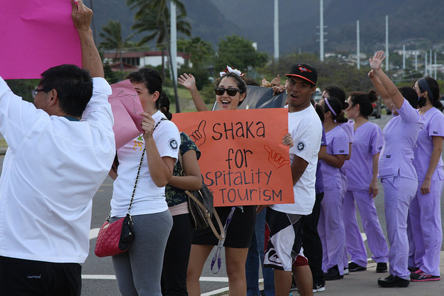 UHMC Get Your Reg On!!! campaign sign waving event along Kaʻahumanu fronting the Kahului campus. Photo courtesy UHMC.