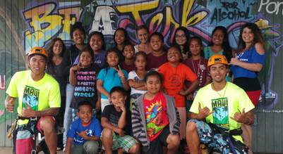 Zipline staff members Brennan Black and Kaulana Bongolan with keiki from the Big Brothers Big Sisters of Maui Afterschool Mentoring Program and School Based Case Manager Ashlee Chapman.