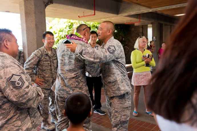 Mayor Alan Arakawa and Managing Director Keith Regan were on hand to welcome back 17 Hawaii Air National Guardsmen from the 292nd Combat Communication Squadron from a six-month deployment in the Mideast. (Photos: Ryan Piros) (7.28.2015)