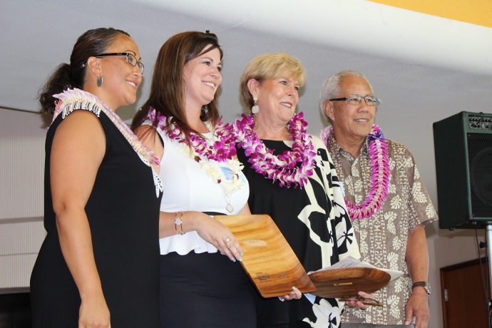 Deanna Davis and Sandra Florence received co-volunteer of the Year honors at the 46th Annual MUW Meeting and Recognition Luncheon for their role in spearheading the Shelter Renewal Project for Women Helping Women. Photo by Wendy Osher. (July 2, 2015)