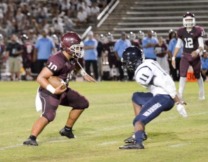 Baldwin's Chazz Sa'u (10) tries to cut inside on Kamehameha Maui's Tyerell Baldonado-Kaleiopu (11) . Photo by Rodney S. Yap.