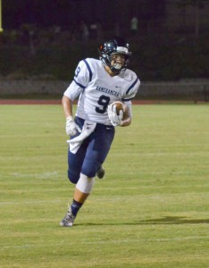 Kamehameha Maui's Kai Segundo finds some open running room against Baldwin Saturday. Photo by Rodney S. Yap.