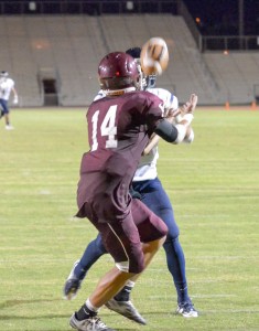 Kamehameha Maui's Kamuela Kaniaupio (2) breaks up this would-be touchdown catch intended for Baldwin's Kaylon Santos-Kekona Saturday. Photo by Rodney S. Yap.