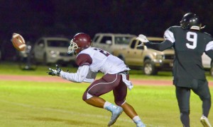 Baldwin's La'akea Kahoohanohano prepares to pick this Kekaulike pass and return it 85 yards for a touchdown Saturday at King Kekaulike. Photo by Rodney S. Yap.