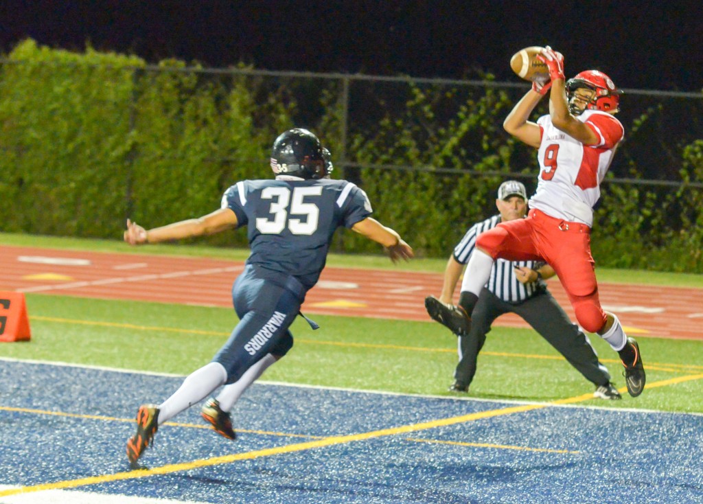 Lahainaluna wide receiver Ronnie Espiritu hauls in the second of his two touchdown catches Friday against Kamehameha Maui. Photos by Rodney S. Yap.