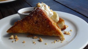 Corn-flake crusted French toast with lilikoi-pineapple-marmalade filling at Nalu's South Shore Grill. Photo by Kiaora Bohlool.