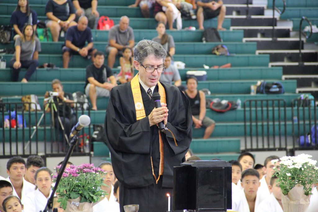 Kahului Hongwanji Resident Minister Richard Tennes commences the 56th Honpa Hongwanji State Judo tournament with open prayers and aspirations. Photo credit: Cy Yoshizu