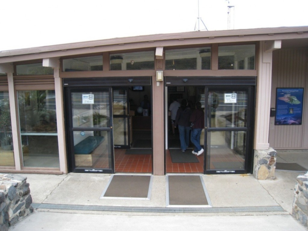 The doorway will be reconfigured so that wind and rain will not blow directly onto visitors or flood the visitor center. A wall will replace the existing interior doors. Photo credit: Haleakalā National Park.