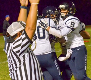 Kamehameha Maui celebrates Ekolu Watanabe's go-ahead touchdown catch Saturday. Photo by Rodney S. Yap.
