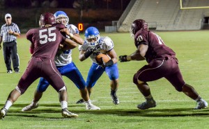Maui High's Soane Vaohea (1) sees an opening in the Bears' goal-line defense and scores a touchdown. Photo by Rodney S. Yap.