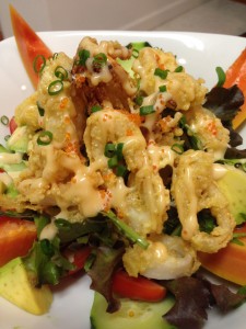 Crispy Calamari and Kumu Farms Organic non-GMO Papaya Salad at Maui Fresh Streatery. Photo by Kiaora Bohlool.