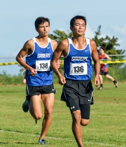 Maui High's Deion Giron (136) and Shaye Thorup helped the Sabers finish seventh in the team standings Saturday at Seabury Hall. Photo by Rodney S. Yap.