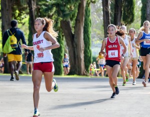 Seabury Hall's Ava Shipman leads Iolani's Amanda Beaman early in the first mile Saturday at Seabury Hall. Photo by Rodney S. Yap.