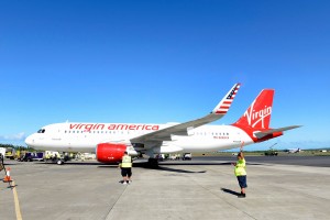 Virgin America commenced service from San Francisco to Kahului, Maui. The inaugural flight included a "Spray of Aloha" and water blessing as the aircraft landed on Maui; a fresh flower lei greeting; and Made in Maui amenity bag; hula dancing and Hawaiian music. Photo credit: Maui Visitors and Convention Bureau Virgin America.