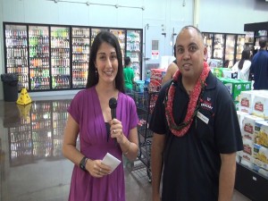 Kiaora Bohlool interviews Island Grocery Depot assistant manager Russell Romo.