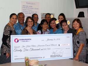 (Left to right, back row) Debbie Nakanelua Richards, community relations director at Hawaiian Airlines; Brian Sabog, flight attendant; Zelda Alimoot, flight attendant; Kuata Ofoia, flight attendant and breast cancer survivor; Debbie Phillips, flight attendant; (front row) Amanda Allison, ‘Imi Hale project specialist; JoAnn Tsark, ‘Imi Hale Native Hawaiian Cancer Center Network project director; Moana AhYuen Wheelon, flight attendant and breast cancer survivor; Heather Ukauka, flight attendant; and Sharlene Chun-Lum, Papa Ola Lōkahi executive director. Hawaiian Airlines photo.