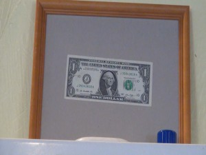 Dollar posted on the wall at Maui Pasta Company. Photo by Kiaora Bohlool.