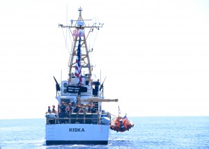 USCGC Kiska (WPB 1336) recovers their small boat while off Maui in the Hawaiian Islands Humpback Whale National Marine Sanctuary, Feb. 11, 2016, during Operation Kohola Guardian. Coast Guard members from Station Maui and the Kiska and officers from the Hawaii Department of Land and Natural Resources conducted safety and compliance boardings on recreational and commercial vessels to inform the public of the requirements to avoid coming too close to whales or impeding the whales’ path. (U.S. Coast Guard photo by Chief Petty Officer Sara Mooers/Released)