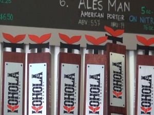 Whale-themed taps at Koholā Brewery in Lahaina. Photo by Kiaora Bohlool.