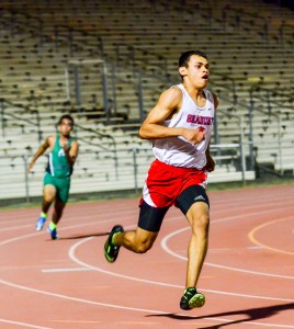 Seabury Hall's Isaiah Payne won his heat of the 100, 200 and 400 on Friday at MIL Meet #3. Photo by Rodney S. Yap.