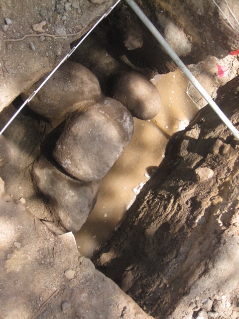Closeup shots of the Cultural Surveys Hawai‘i work trench that uncovered the location and corner stones of the causeway (last year). The causeway connected the King’s Road (Front Street) to the island and would have been guarded by sentries. It’s located in the Moku‘ula parking lot at the Front Street driveway entrance. Photo courtesy: Friends of Mokuʻula.