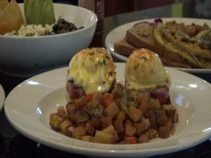 Ahi eggs Benedict at Three's. Photo by Kiaora Bohlool.