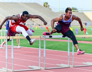 Baldwin's La'akea Kahoohanohano-Davis won the 110-meter high hurdles over Lahainaluna's Kamal Golaube. The victory was one of four individual events Kahoohanohano-Davis won at the Kamakea Meet last week. Photo by Rodney S. Yap.