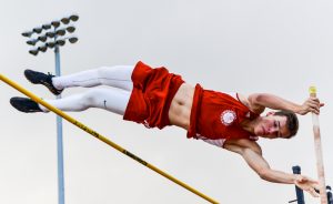 Lahainaluna's Anis Bel clears the pole vault crossbar at 13 feet, 6 inches. The Luna vaulter finished second to event winner Sean Fukuhara of Baldwin High School. Photo by Rodney S. Yap.